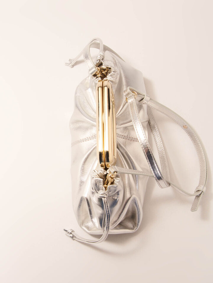 Leather metal handle clutch